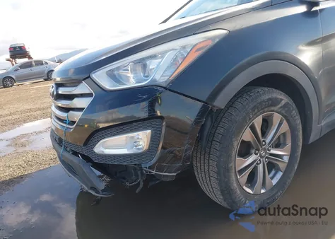2015 Hyundai Santa Fe Sport 2.4L z USA, uszkodzony, nr VIN 5XYZUDLB0FG244699